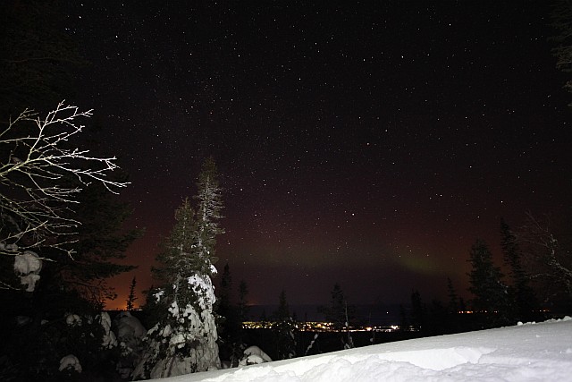 We even spot a very faint Aurora towards the North, interfering with the glow from the town of Luosto in the distance.