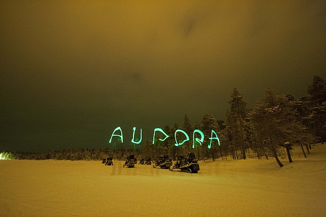 And if the Aurora is not visible due to clouds (like on our third night), you can make your own Aurora over the snowmobiles on the lake...
