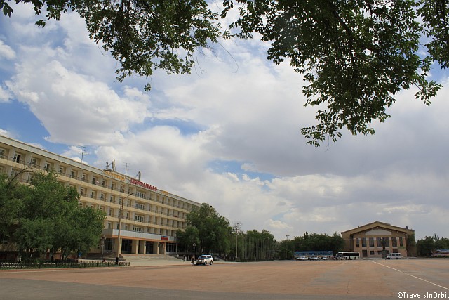 City center is located in the south-eastern part of Baikonur, around Lenin Square and the bottom part of Korolev Avenue, locally known as 'Arbat'. On Lenin Square you will find Hotel Tsentralnaya, the main Roskosmos office and the old Officer's Club, now a disused building behind the statue of Lenin.