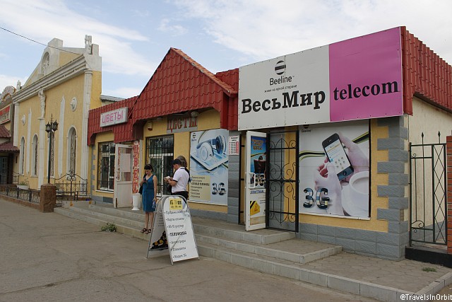 This Beeline shop is the most helpful place to get a local SIM card for voice and data. The sales people speak enough English to understand what you want (most shopkeepers in Baikonur don't) and will help you set up your phone such that it actually works.