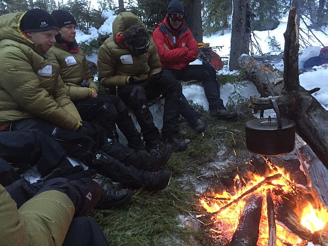 A camp fire is critically important during cold evenings when winter camping. It provides warm water, warm food and is psychologically important, as it creates a warm atmosphere in the dark and cold winter forest.